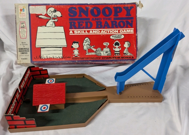 Vintage Snoopy and the Red Baron Skill & Action Game. Not all parts present, see photos for contents.