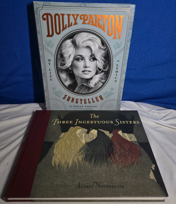 2 Hardcover Books: Dolly Parton: My Life In Lyrcis & Audrey Niffenegger: The Three Incestuous Sisters
