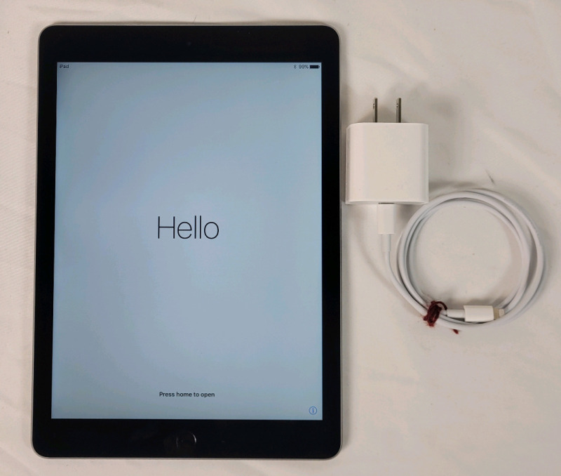 As Is - Apple iPad Air 2 64gb Tablet w/Charger . Tested Powers Up , Factory Reset . Password Protected Locked - As Is