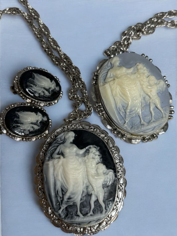 Two Cameo Necklaces One Black With Earrings One Light Blue