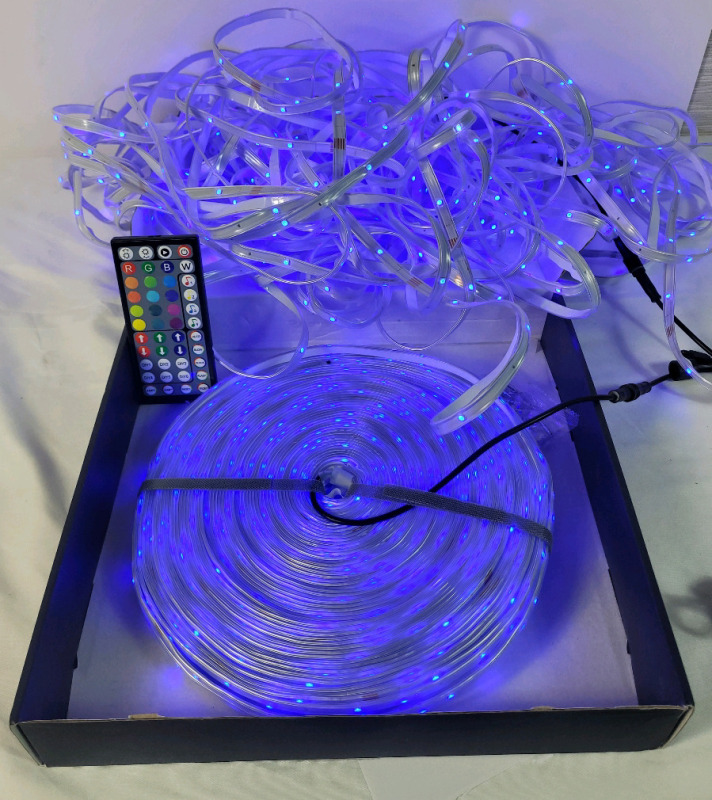 300ft. Outdoor Waterproof LED Strip Lighting with Remote , 15 Different Colors . 2 Rolls of Lights , 1 Roll Unraveled . Tested Working