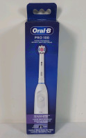 New - Oral-B Pro 100 Power Toothbrush Kit . 1 Handle , 1 Brush Head & 2 Batteries . Sealed