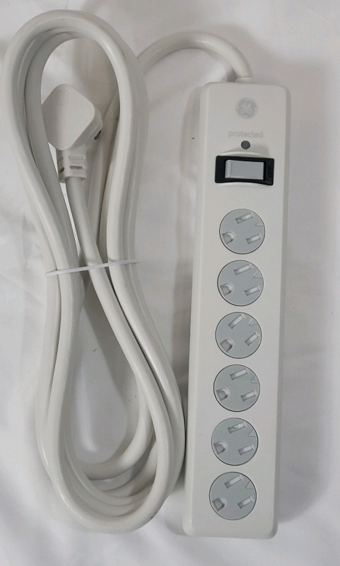 New - GE 6-Outlet 10ft. Surge Protector Extension Cord, Power Strip, 800 Joules, Flat Plug, Twist-to-Close Safety Covers, Protected Indicator Light, UL Listed, White,