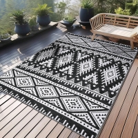 New OLANLY Waterproof Outdoor Rug 4x6 ft, Reversible Plastic Straw Rug.