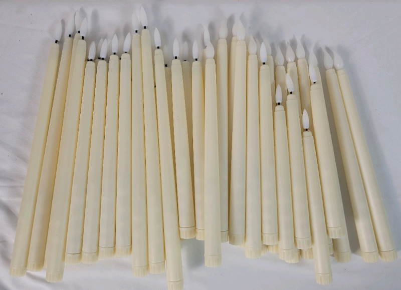 42 Flameless LED Candles w/2 Remotes . Each Candle requires 2AAA Batteries . Not all candles tested . Candles measure 8.5" to 12 3/4" tall
