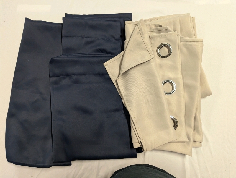 4 New Curtain Panels. Curtens With Eyelet Holes are 34" by 84". Navy Curtains are 40" by 84.