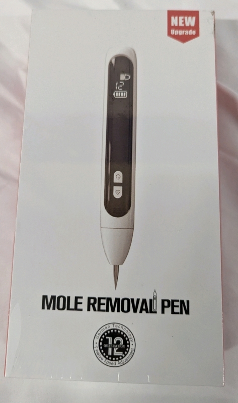 New Sealed Mole Removal Pen.