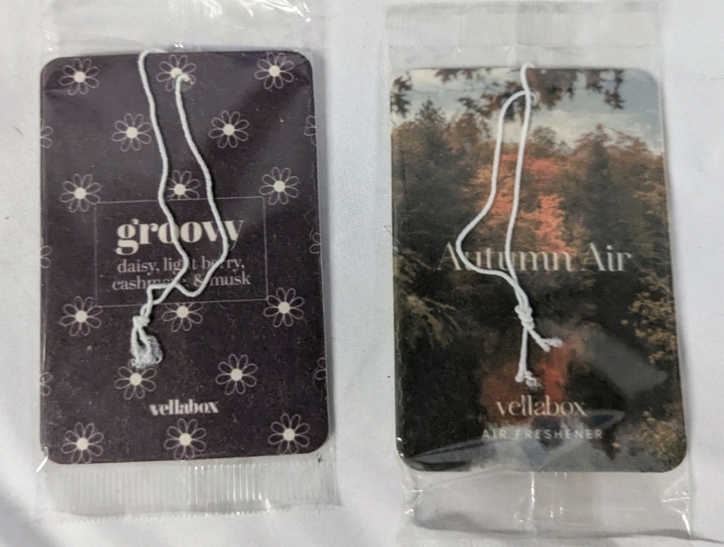 New Beautiful Moon "Galactic Skies" Scented Candle (16oz) & New Vanilla And New Spruce "Grey Sweater" Scented Candle. with 2 New Vellabox Air Fresheners. Grey Sweater Has Damaged Jar.