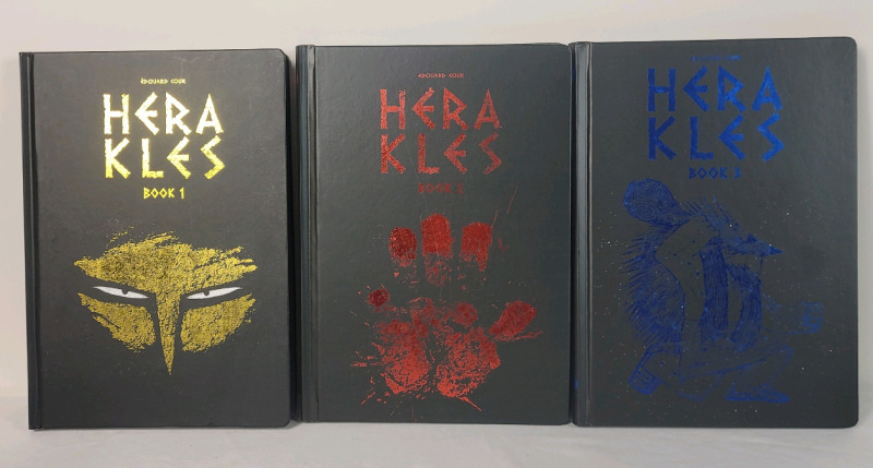 New - HERAKLES by Edouard Cour Hardcover Graphic Novels , 3 Book Set . Slight scratch on cover of book 2 . Retail $80