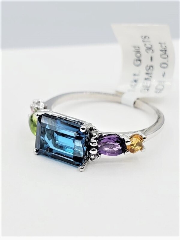 14KT White Gold Natural Blue Topaz (2.25ct), Amethyst (0.15ct), Golden Beryl (0.12ct) Peridot (0.42ct) Pink Tourmaline (0.11ct) and Diamond (0.04ct) Ring, Size 6.5, W/A $2390.00.