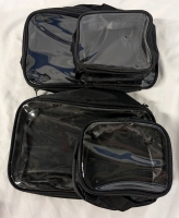 4 Travel Bags with Transparent Sides. Largest Measures 11"by7"