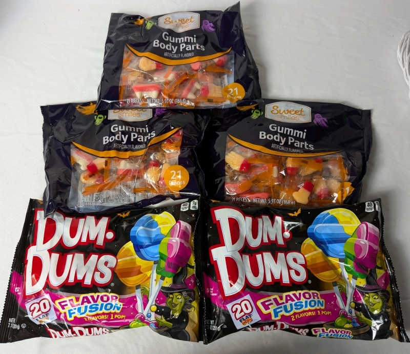 New Assorted Candy. 2 New Packs of Dum-Dums (201g each, best before 05/07/27) & 3 Packs of Sweet Smiles Gummi Body Parts (168g Each, Best Before 8/16/2025)