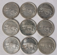 1967 (1867-) Canadian Silver 25 Cent Quarters . Nine (9) Coins