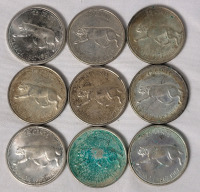 1967 (1867-) Canadian Silver 25 Cent Quarters . Nine (9) Coins