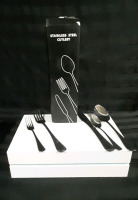 NEW in damaged box. Stainless steel cutlery. 8 place settings with a very simple pattern. Great for the h