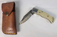 New - Damascus Steel Single Blade Folding Pocket Knife with Leather Belt Case . Measures 6 5/8" long when open