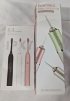 Oral Healthcare Lot. X-3 Sonic Toothbrush & Portable Oral Irrigator.