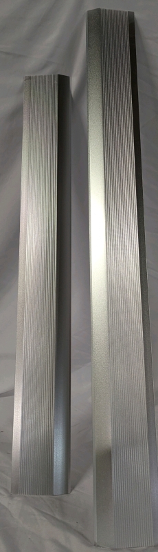 2 Doorway Threshold Transition Covers. Made of Metal. Slope is 2.9" Long overing 1" of height change. 32" Long and 38.5" long.