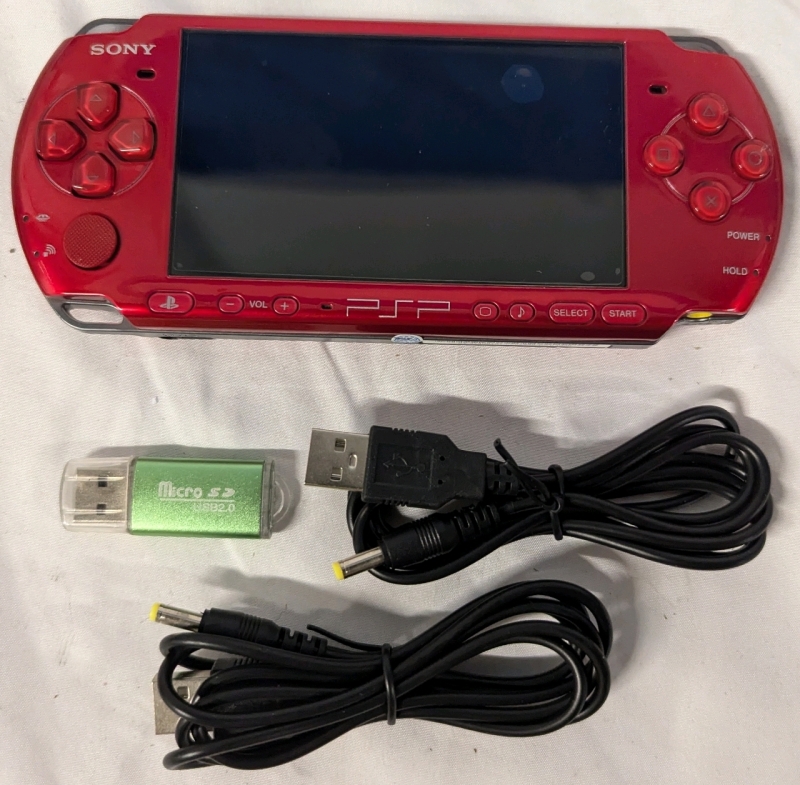 Sony PSP, With Memory Card, USB Stick & USB Charge Cables. Powers On.