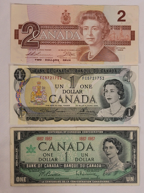 1967 & 1973 Canadian Bank of Canada One Dollar Bank Notes plus 1986 Canadian Bank of Canada Two Dollar Bank Note . 1973 Bank Note is Uncirculated