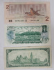 1967 & 1973 Canadian Bank of Canada One Dollar Bank Notes plus 1986 Canadian Bank of Canada Two Dollar Bank Note . 1973 Bank Note is Uncirculated - 2