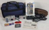 Canon PowerShot A10 Digital Camera & Pentax Optio A20 Digital Camera plus Extra