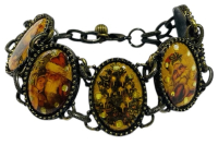 Vintage Nina Ricci NR For Avon Cellulose Paneled Christmas Bracelet Santa Angel Tree