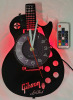 New - Gibson Les Paul Vinyl LP Wall Clock w/LED Back-Light & Remote . Measures 12" . Requires One (1) AA Battery (not included) - 2