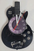 New - Gibson Les Paul Vinyl LP Wall Clock w/LED Back-Light & Remote . Measures 12" . Requires One (1) AA Battery (not included) - 3