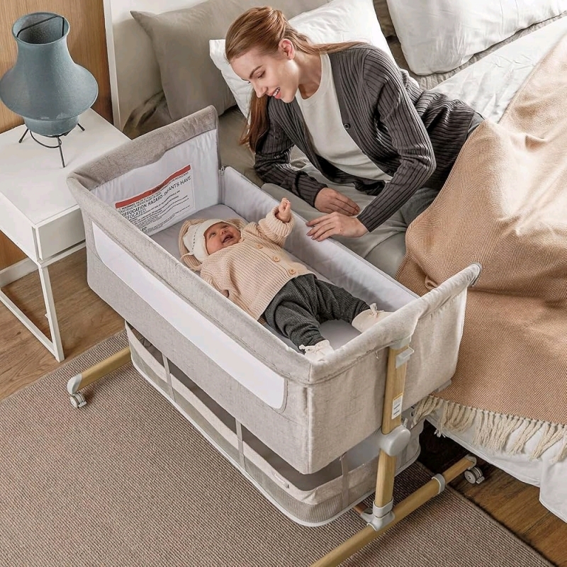 New Besrey Baby Bassinet Bedside Sleeper. Bedside Bassinet for Infant Newborn with Comfy Mattress, 9 Height Positions, Adjustable Bedside Crib with 360° Swivel Wheels Bassinet for Baby with Storage Basket. 39" by 20" by 26". Retails for $290.00