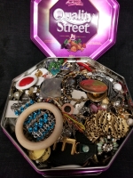 Chocolate tin full of jewelry