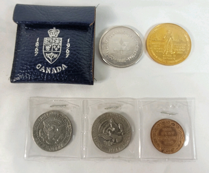 Canadian & USA Coins & Tokens . 1967 Confederation Toke , 1967 Ontario Confederation Mining Token , 1918 Canadian Penny and 1977 & 1989 USA Kennedy Half Dollars .
