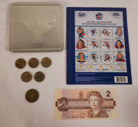Canadian Coin & Stamp Lot . 1986 Two Dollar Bank Note , 1987 - 1995 Loonies (5) , 50th NHL All-Star Game Stamps (sealed) , 2000 Millennium Stamp & Coin plus 1967 Confederation Coin