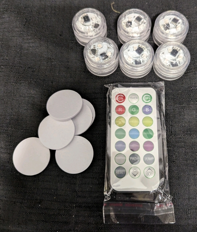 New: 6 Small Battery Powered LED Lights - Stick To Surface and Control With Remote