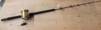 Vintage PENN International 50W 2-Speed Conventional / Spinning Fishing Reel with Fishing Rod . Line Capacity: 850 yards of 50 pound test line<br/>Gear Ratio: 3 to 1 in high , 1.3 to 1 in low