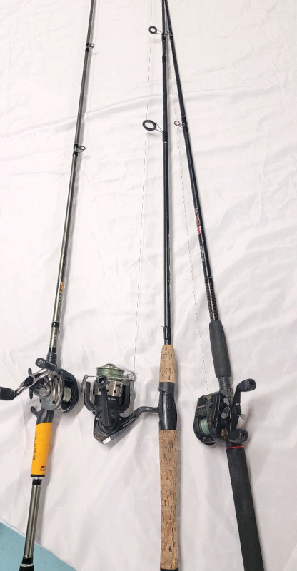 Genesis , Abu Garcia & Daiwa Fishing Reels on Graphite Fishing Rods . See Photos . Rods measure 78" to 83" long