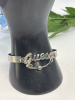GUESS Logo Spell Out Bangle Sparkly CZ Silver Tone Cuff Stack Kitsch Retro Hammered Open Cuff Bracelet - 4