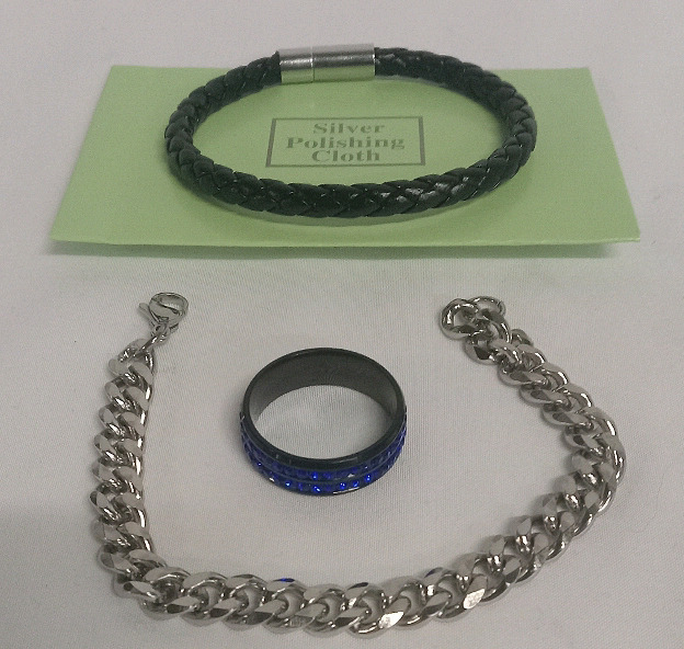 New | 4 pcs Men's Jewlery Set Includes: Silver Polish Cloth, Faux Leather Bracelet, Size 12 Ring w/ Blue Rhinestones & Silver Toned Bracelet