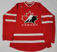 Size Medium World Jr. Team Canada Long Sleeve Jersey . Would benefit from cleaning before use. Some minor stains