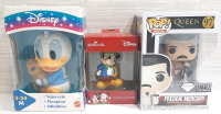 Lot of Pop Culture Figures, Including A 1997 Mattel Disney Donald Duck Squeezie, A Hallmark Mickey Mouse Christmas Tree Ornament & Freddie Mercury Funko Pop Vinyl Figure