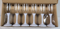 New - 6-Multi-Color LED Light-Up Champagne Flutes . Made of Plastic , Lights Up when Liquid is Added to Glass
