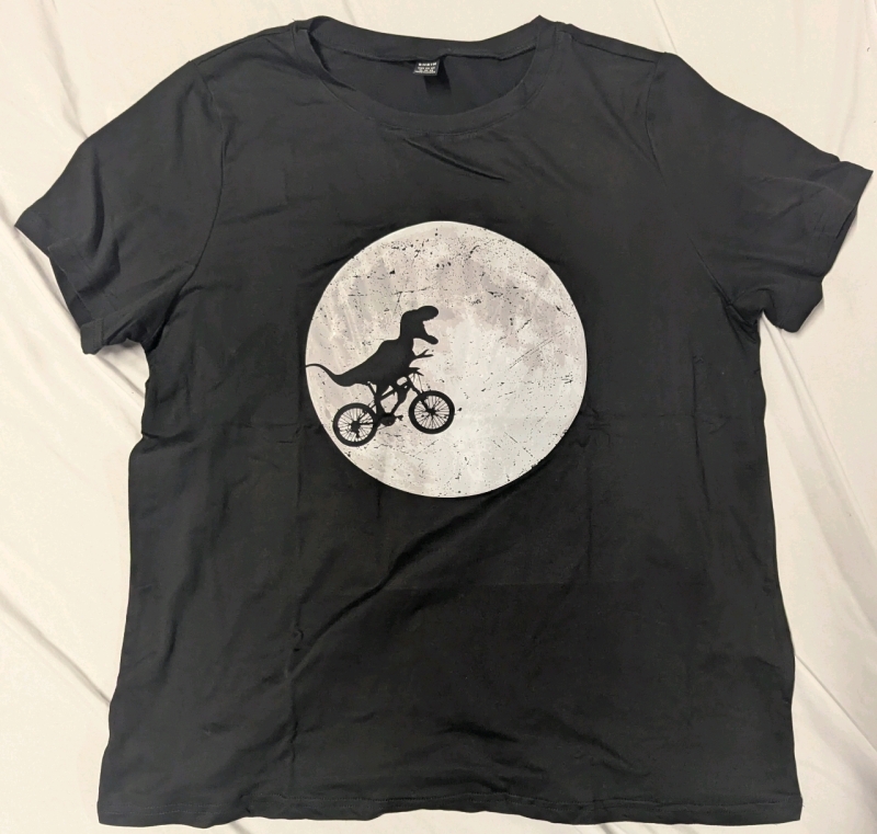 New: Size XL Women's - Dinosaur Cycling Across Moon T-Shirt