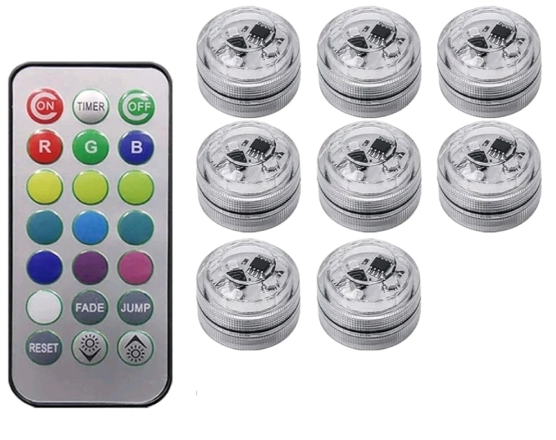 New - 8Pc Wireless Colorful LED Interior Ambient Light w/Remote Control . Battery Operated Mini Lantern Decoration . Each Light measures 1 1/8" diameter