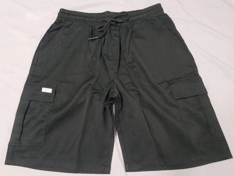 New - Sz. Large Manfinity Men's Black Shorts w/Elastic Waist & Tie-Up String . Plus 6 Pockets (2 front, 2 back, 2 side)