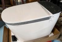New (with Damage. See photos)Woodbridge Smart Bidet Toilet 17.5" Seat Height. Model B0930S