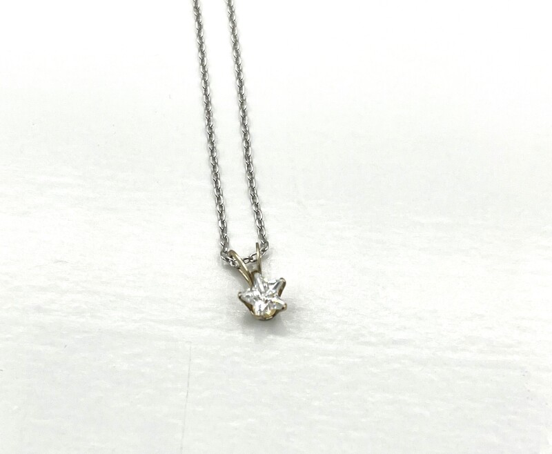 New 10KT White Gold CZ Star Pendant with Sterling Silver Chain, Retail $350.00.