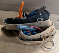 Electricians Tool Belt with Assorted Tools.