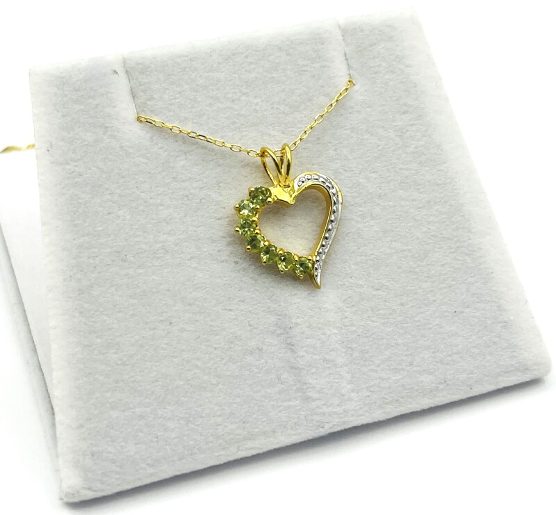 Gold Plated Sterling Silver Natural Peridot (0.35ct) Heart Shape Pendant With Gold Plated Sterling Silver Chain, W/A $670.00. Peridot is the birthstone for August.
