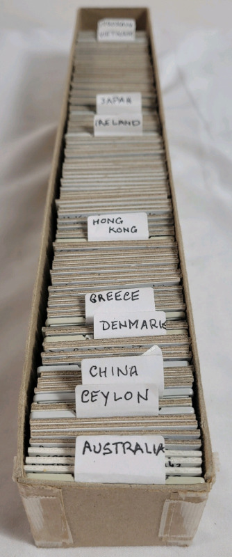 1927 - 1990 World Coin & Token Lot . 105+ Coins in 2&times;2 Coin Holders . Australia , China , Greece , Hong Kong , Japan plus more