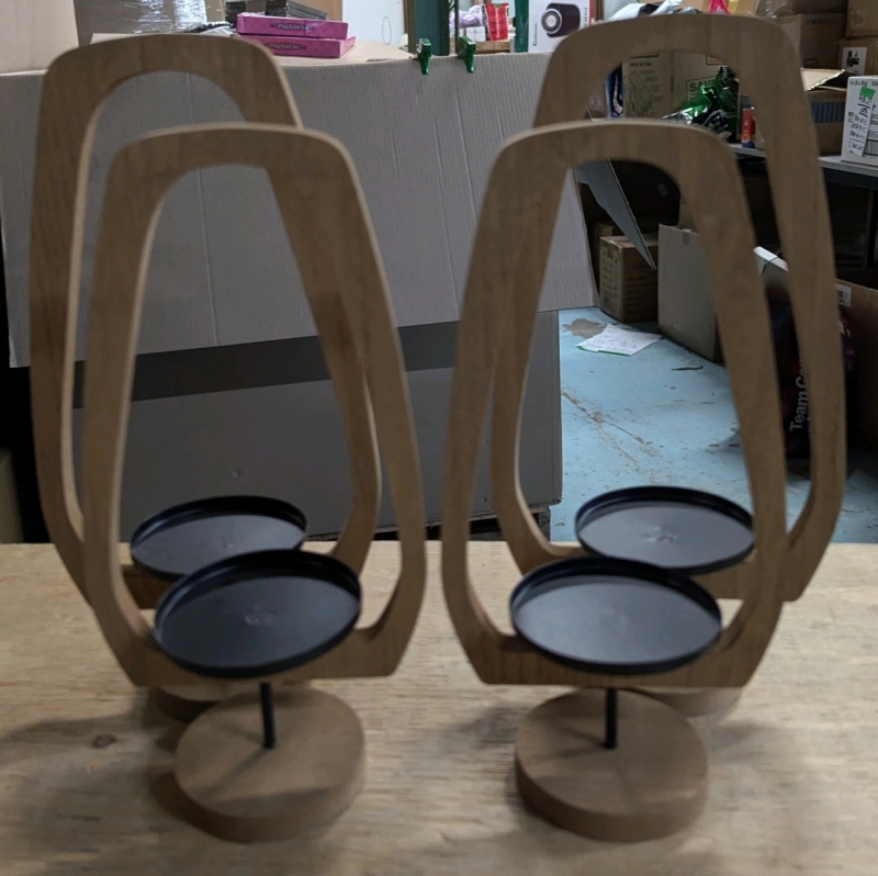 4 New Wooden & Metallic Candle Holders. 2 Smaller measuring 10.75" Tall, 2 Larger Measuring 12" Tall.